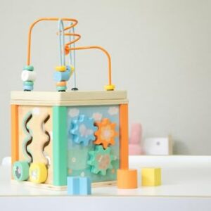 Alternative view of SMALL FOOT — Cube de motricité en bois pastel